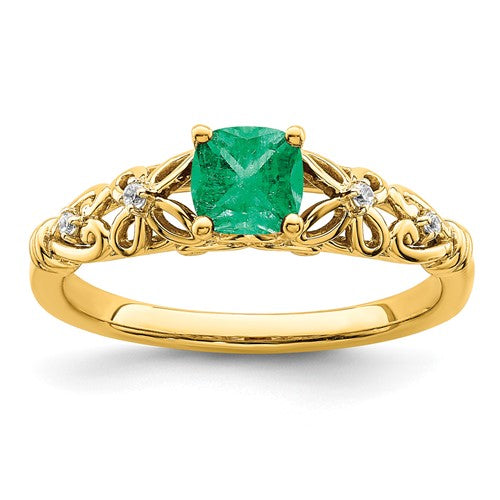 14k gold polished emerald and diamond ring featuring a central emerald gemstone with diamond accents, elegant jewelry from Solomon Jewelers.