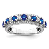14k white gold sapphire and diamond ring with polished finish, featuring sparkling gemstones and elegant craftsmanship.
