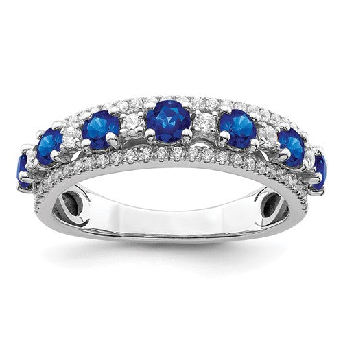 14k white gold sapphire and diamond ring with polished finish, featuring sparkling gemstones and elegant craftsmanship.