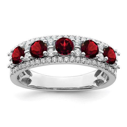 14k white gold garnet and diamond ring with polished finish, featuring a vibrant garnet stone and sparkling diamonds.