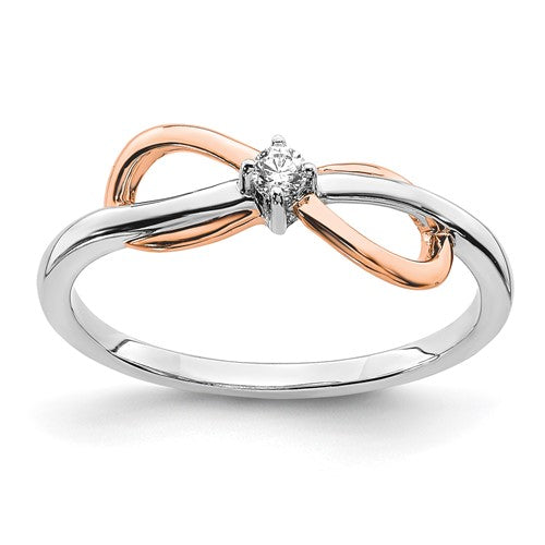 14k two-tone white and rose gold infinity diamond ring showing polished finish and sparkling diamonds from Solomon Jewelers.