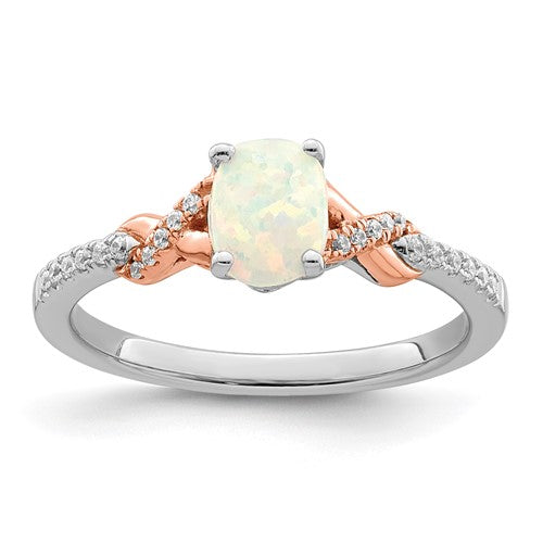 14k two-tone polished oval opal and diamond ring showcasing a vibrant opal center with sparkling diamonds in a jewelry ring design