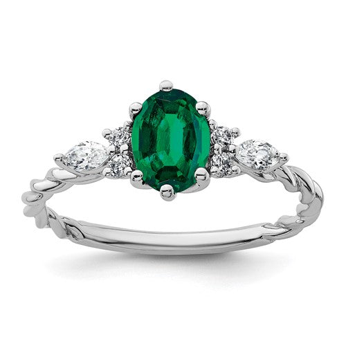 14K white gold twisted ring with polished finish featuring diamonds and lab-created emeralds, jewelry by Solomon Jewelers.