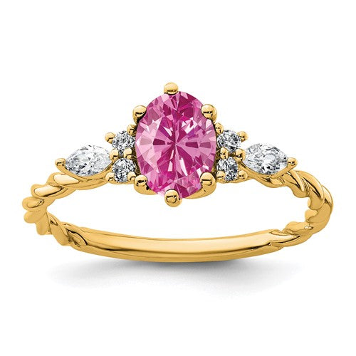 14K polished gold twisted ring with diamonds and lab-created pink sapphires from Solomon Jewelers.