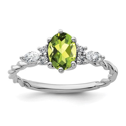 14K white gold twisted ring with polished finish, featuring diamonds and peridot gemstones, designed by Solomon Jewelers.