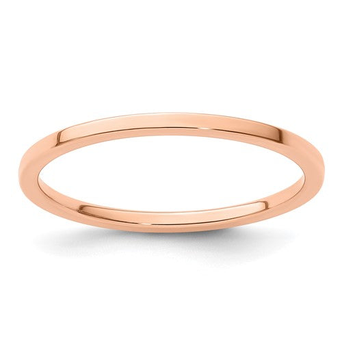 14K rose gold flat stackable ring with a 1.2mm width from Solomon Jewelers, showcasing a smooth, polished band design.