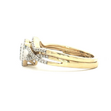 1/4 Ct. T.W. Pear-Shape Diamond Bridal Ring Set in 10k Gold - Solomon Jewelers