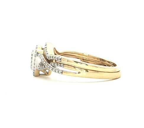 1/4 Ct. T.W. Pear-Shape Diamond Bridal Ring Set in 10k Gold - Solomon Jewelers