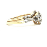 1/4 Ct. T.W. Pear-Shape Diamond Bridal Ring Set in 10k Gold - Solomon Jewelers