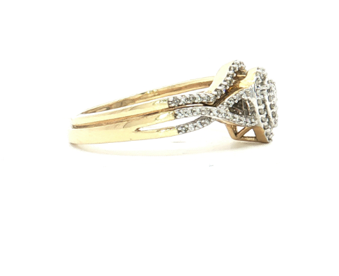 1/4 Ct. T.W. Pear-Shape Diamond Bridal Ring Set in 10k Gold - Solomon Jewelers