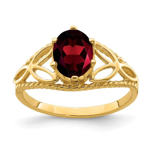 14k gold oval garnet ring with 8x6mm gemstone, featuring a classic jewelry design from Solomon Jewelers