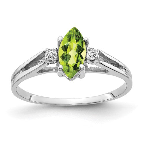 14k white gold ring featuring an 8x4mm marquise peridot and AA-grade diamonds, elegant jewelry from Solomon Jewelers