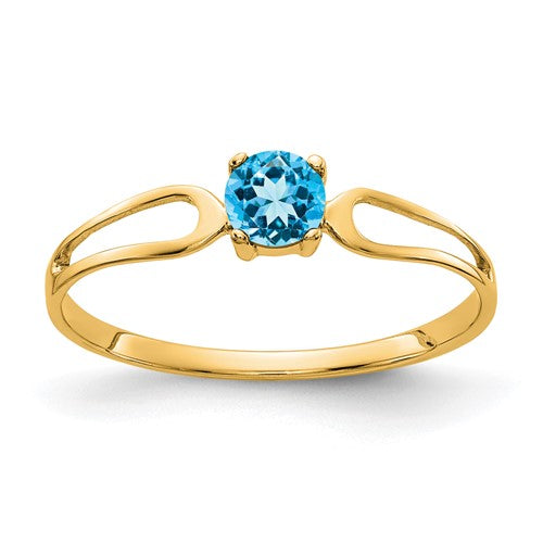 14k gold ring featuring a 4mm blue topaz gemstone, elegant jewelry ring with Solomon Jewelers branding.