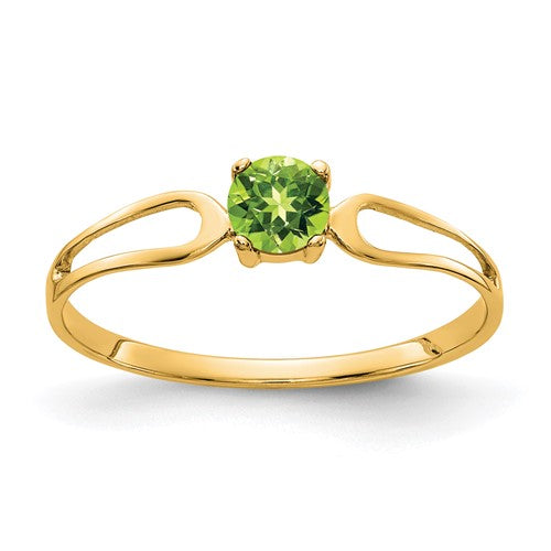 14k gold ring with a 4mm peridot gemstone, showcasing elegant jewelry design.