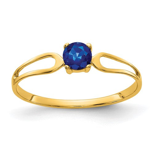 14k gold sapphire ring with a 4mm round blue sapphire gemstone, elegant jewelry ring from Solomon Jewelers.