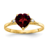 14k gold ring with a 7mm heart-shaped garnet and AA diamond accent, elegant jewelry piece from Solomon Jewelers.