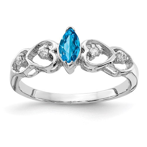 14k white gold marquise blue topaz and AA diamond ring, showcasing elegant jewelry design and sparkling gemstones.