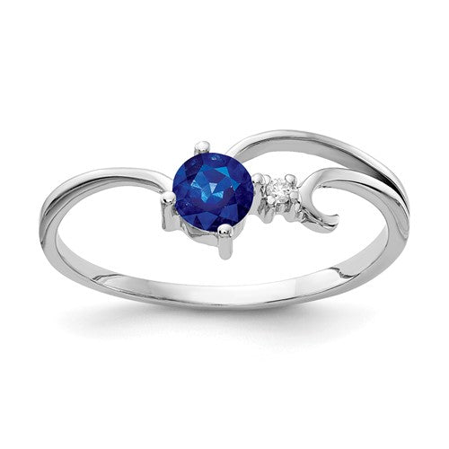 14k white gold sapphire and AA diamond ring with a 4mm setting, elegant jewelry piece by Solomon Jewelers.