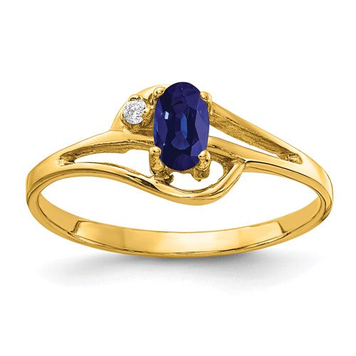 14k gold oval sapphire ring with AA diamonds, featuring a 5x3mm central sapphire and sparkling diamond accents.