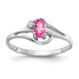 14k white gold ring featuring a 5x3mm oval pink sapphire and AA diamond accents, elegant jewelry by Solomon Jewelers.