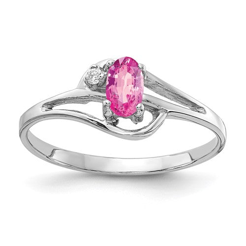 14k white gold ring featuring a 5x3mm oval pink sapphire and AA diamond accents, elegant jewelry by Solomon Jewelers.