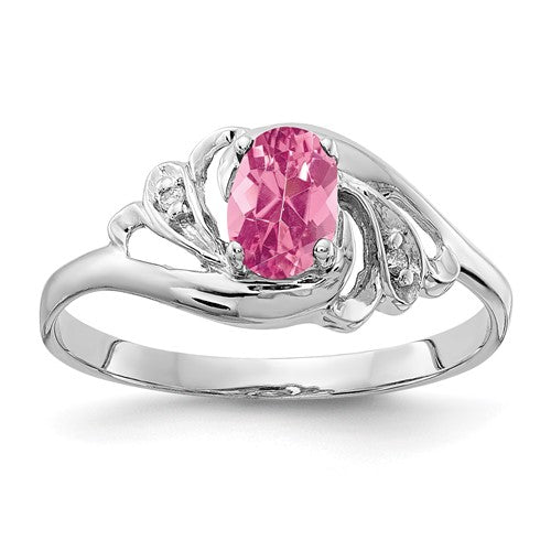 14k white gold ring featuring a 6x4mm oval pink tourmaline and AA diamonds, elegant jewelry piece from Solomon Jewelers.