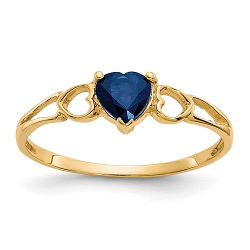 14k gold sapphire birthstone ring from Solomon Jewelers, featuring a vibrant blue sapphire gemstone set in a classic ring design.