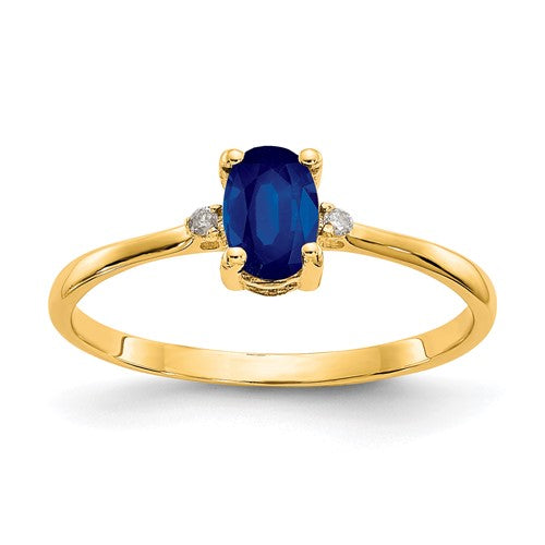 14k gold diamond and sapphire birthstone ring with intricate design, jewelry ring featuring sparkling gemstones and fine craftsmanship.