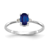 14k white gold diamond and sapphire birthstone ring, featuring sparkling gemstones and elegant design.