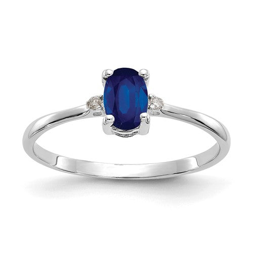 14k white gold diamond and sapphire birthstone ring, featuring sparkling gemstones and elegant design.