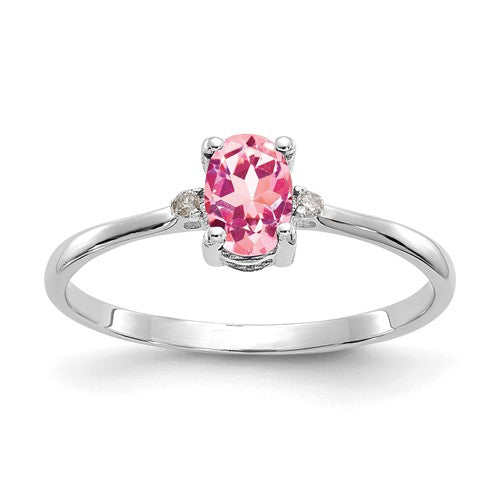 14k white gold diamond and pink tourmaline birthstone ring, elegant jewelry featuring sparkling stones and intricate band design.