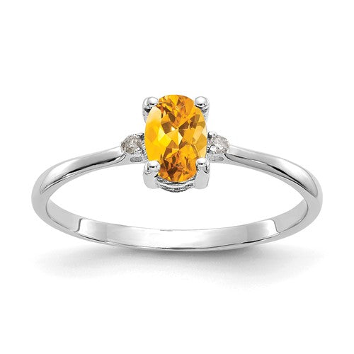 14k white gold diamond and citrine birthstone ring with intricate design, featuring sparkling diamonds and vibrant citrine gemstone.