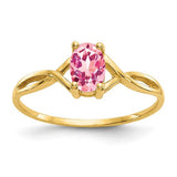 14k pink tourmaline birthstone ring featuring a vibrant pink gemstone set in a gold band, crafted by Solomon Jewelers.