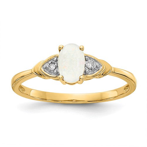14k gold opal and diamond ring featuring a vibrant opal centerpiece and sparkling diamonds, crafted by Solomon Jewelers