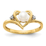 14k white gold cultured pearl and diamond heart ring, elegant jewelry piece featuring a pearl centerpiece with diamond accents.