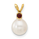 14K gold pendant with white round freshwater pearl and garnet accent, from Solomon Jewelers, showcasing fine craftsmanship.