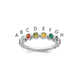 14k white gold mother's ring with eight colorful birthstones, showcasing elegant jewelry design from Solomon Jewelers.