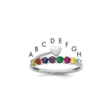 14k white gold mother's ring with heart-shaped setting and eight birthstones, crafted by Solomon Jewelers.