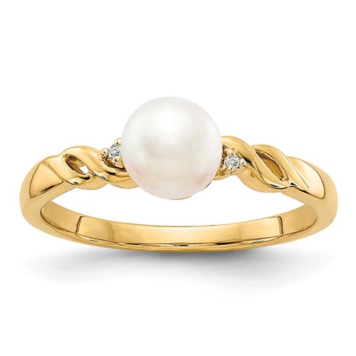 14k white gold cultured pearl and diamond twist ring, elegant jewelry piece with sparkling stones and intricate design.