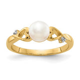 14k gold diamond and freshwater cultured pearl heart ring, showcasing a sparkling diamond and elegant pearl centerpiece.