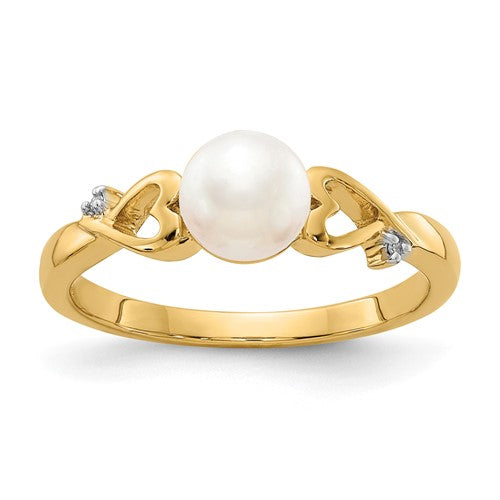 14k gold diamond and freshwater cultured pearl heart ring, showcasing a sparkling diamond and elegant pearl centerpiece.