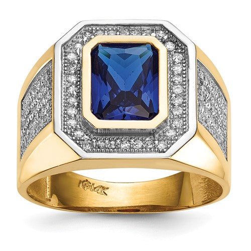 14k gold men's ring with rhodium-plated cubic zirconia and emerald-cut blue CZ, featuring a sleek jewelry design.