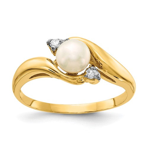 14K gold ring featuring a 5-6mm white freshwater cultured pearl with a .04ct diamond accent, jewelry ring from Solomon Jewelers.