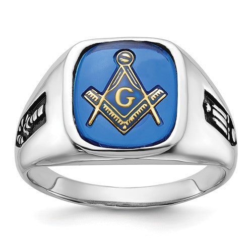 14kw men's grooved Masonic ring with black enamel and imitation blue spinel, crafted by Solomon Jewelers.