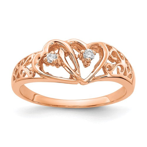 14k rose gold diamond heart ring from Solomon Jewelers, featuring a delicate heart design with sparkling diamonds.