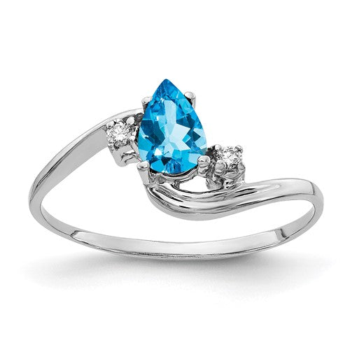 14k white gold ring featuring a 6x4mm pear-shaped blue topaz and AA diamonds, elegant jewelry by Solomon Jewelers