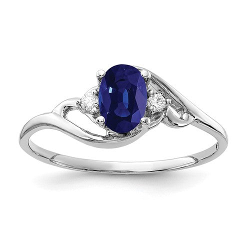 14k white gold sapphire and diamond ring with a 6x4mm oval sapphire and AA-grade diamonds, elegant jewelry by Solomon Jewelers