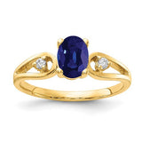 14k gold oval sapphire and AA diamond ring featuring 7x5mm stones, elegant jewelry piece with detailed design.