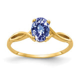 14k gold oval Tanzanite ring with 7x5mm gemstone from Solomon Jewelers, showcasing a elegant jewelry design.