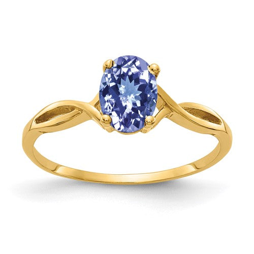 14k gold oval Tanzanite ring with 7x5mm gemstone from Solomon Jewelers, showcasing a elegant jewelry design.